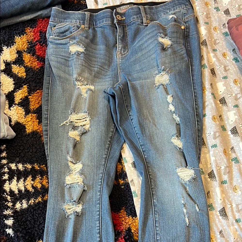 Torrid size 16s Bombshell Skinny Distressed Blue Jeans